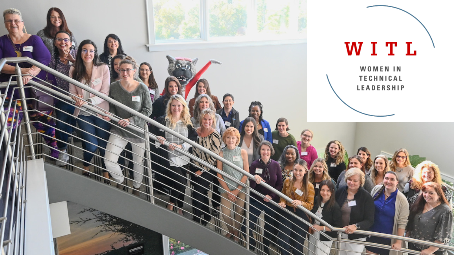 women in technical leadership program attendees alongside the Women in Technical Leadership badge.